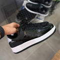 NIKE AIR FORCE ONE NEGRA BLANCA CHAROL
